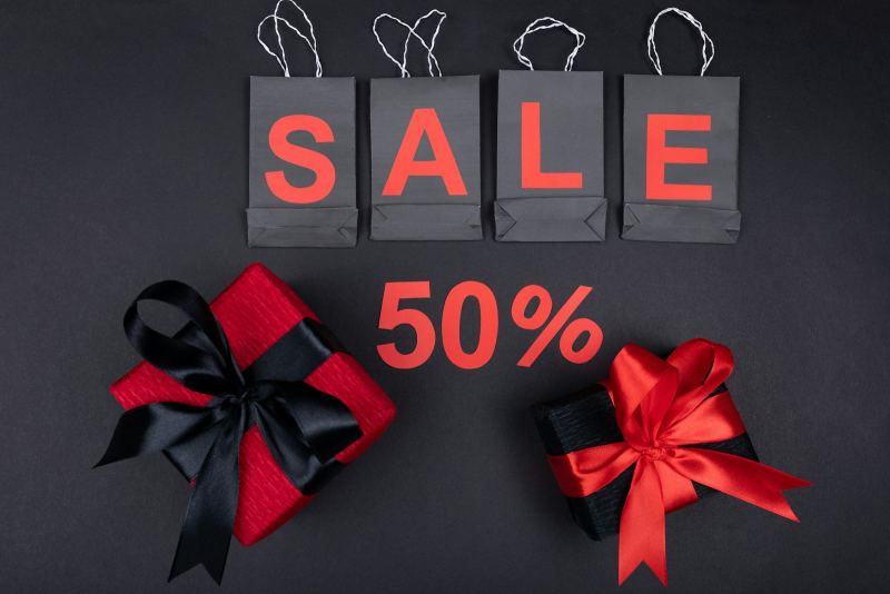 Promotional display with shopping bags