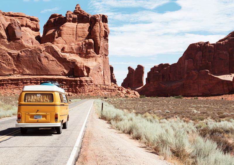 Van travelling on a desert road