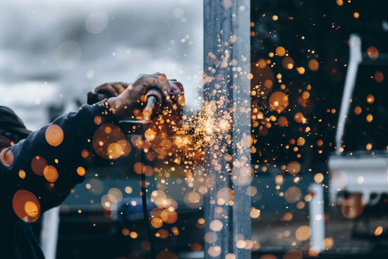 Metal fabrication with welding sparks